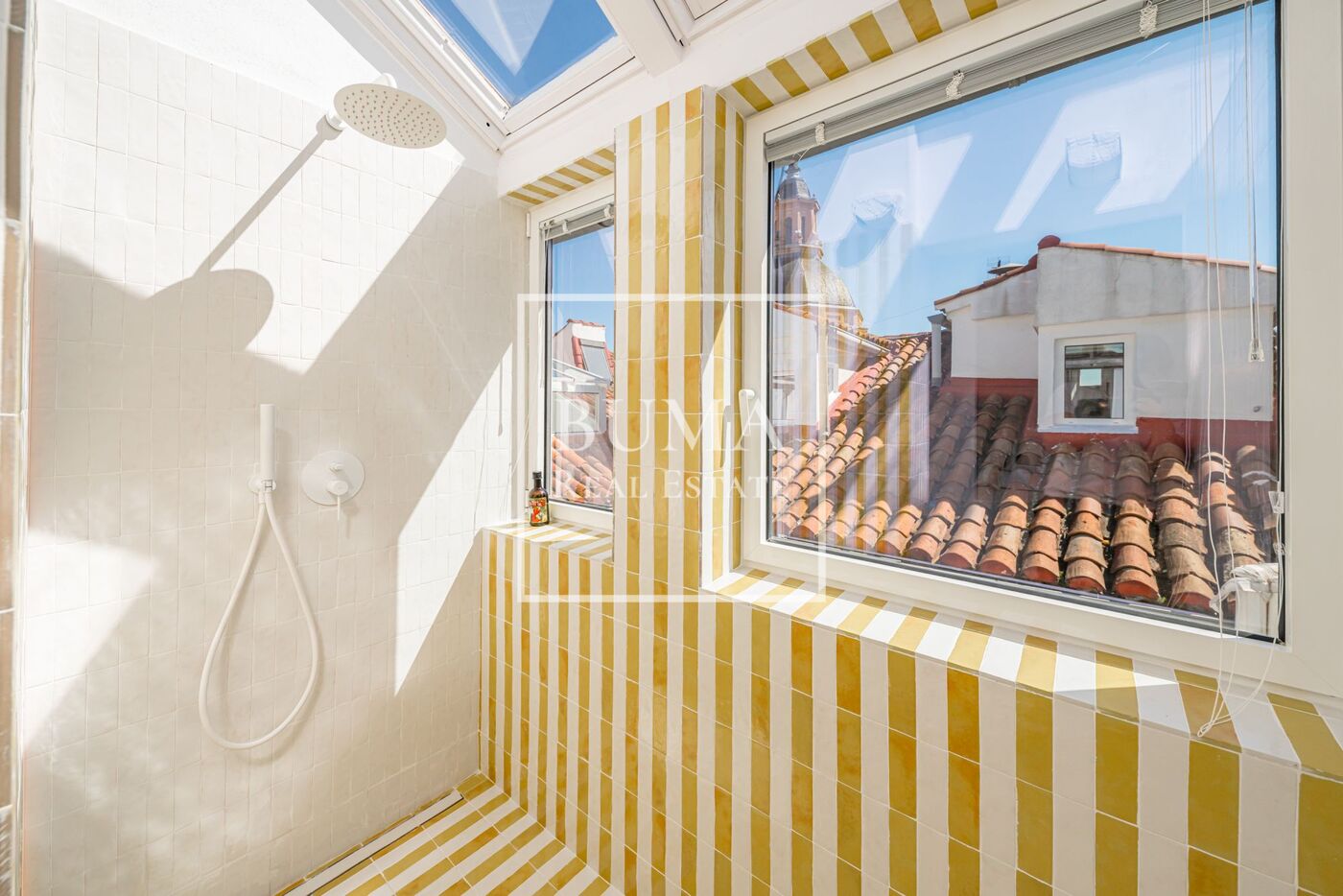 Exclusivo ático de diseño en venta con terrazas en el corazón de Madrid