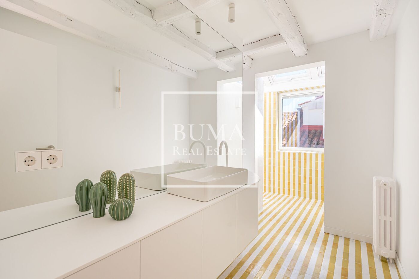 Exclusivo ático de diseño en venta con terrazas en el corazón de Madrid