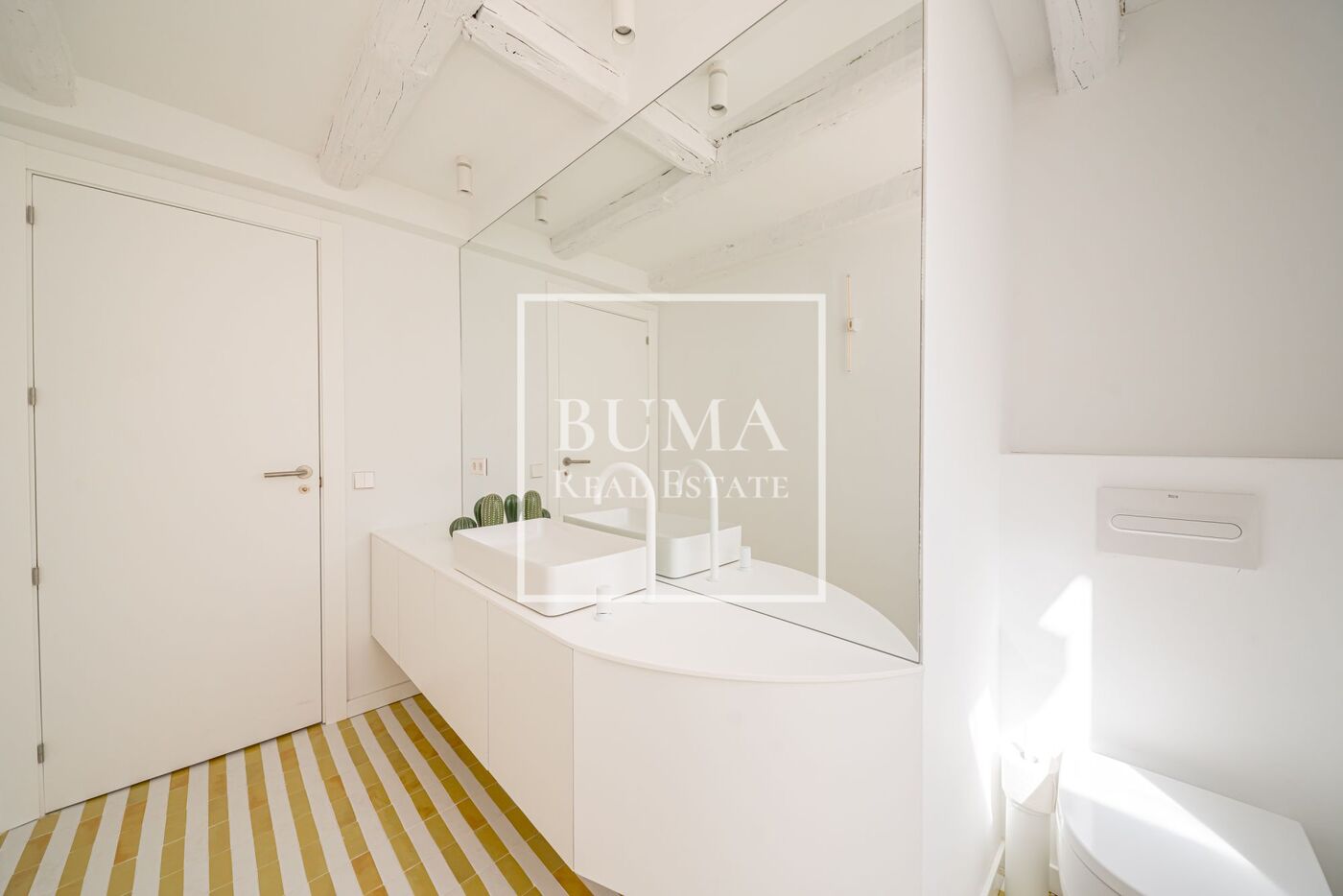 Exclusivo ático de diseño en venta con terrazas en el corazón de Madrid