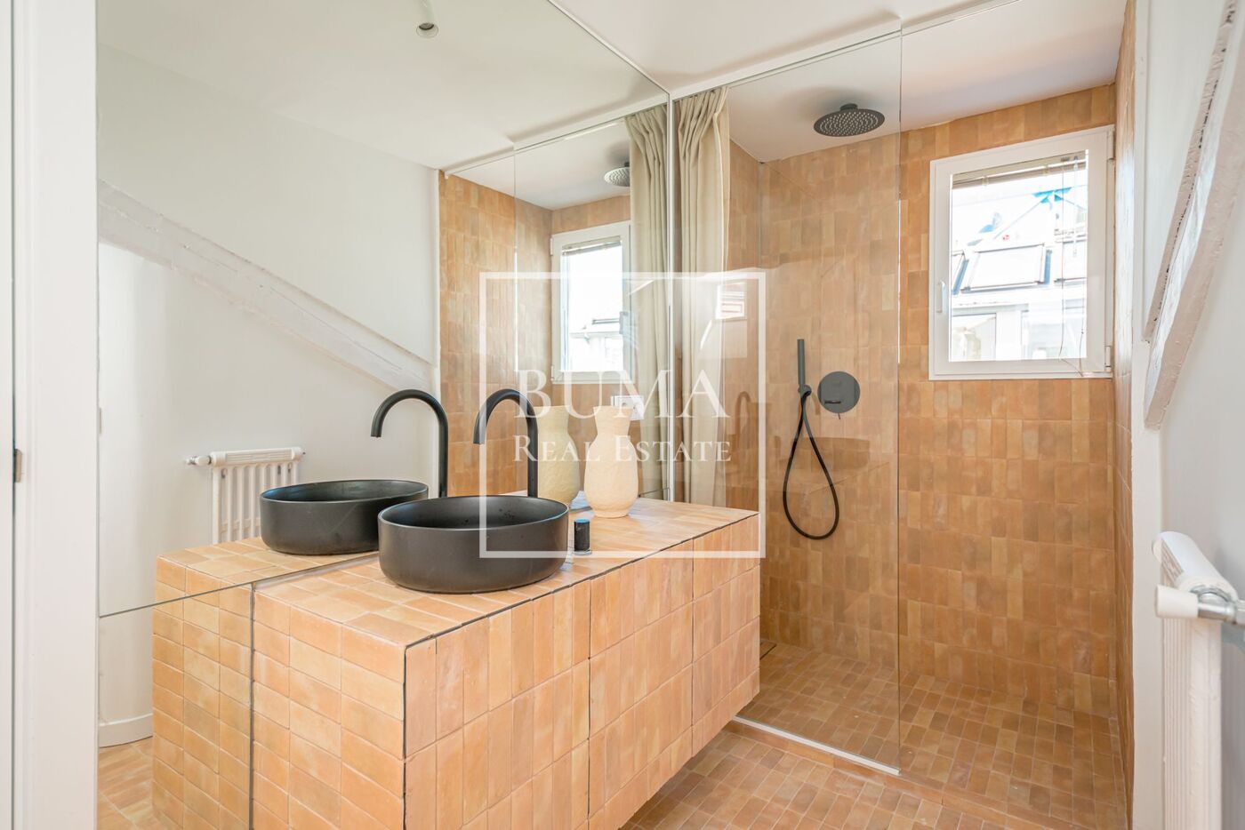 Exclusivo ático de diseño en venta con terrazas en el corazón de Madrid