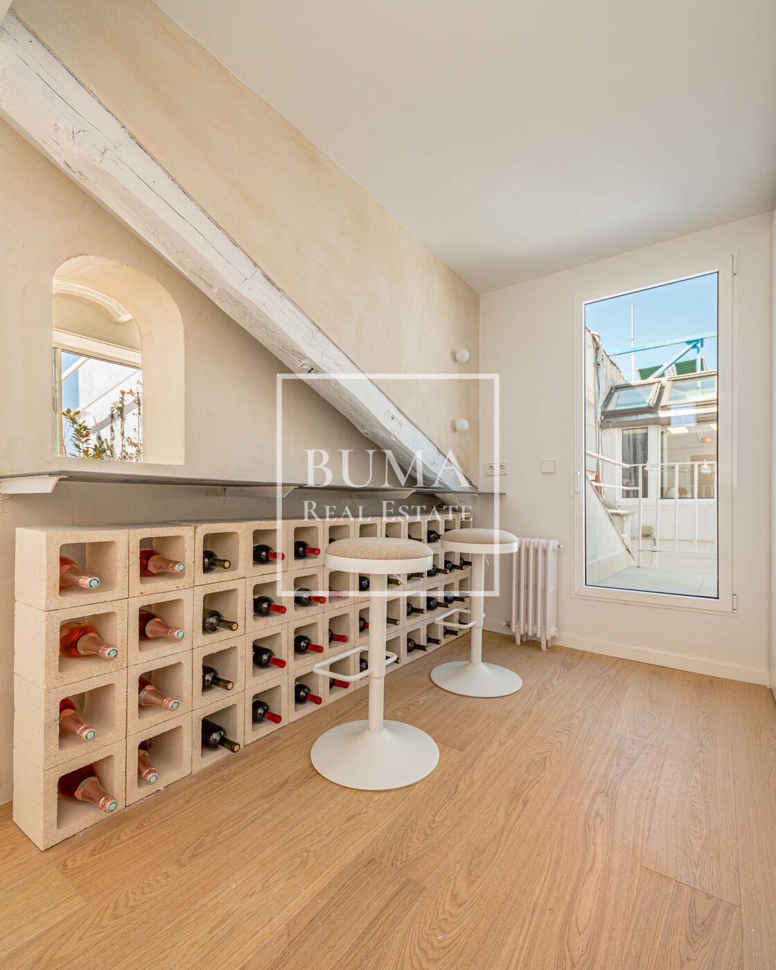 Exclusivo ático de diseño en venta con terrazas en el corazón de Madrid