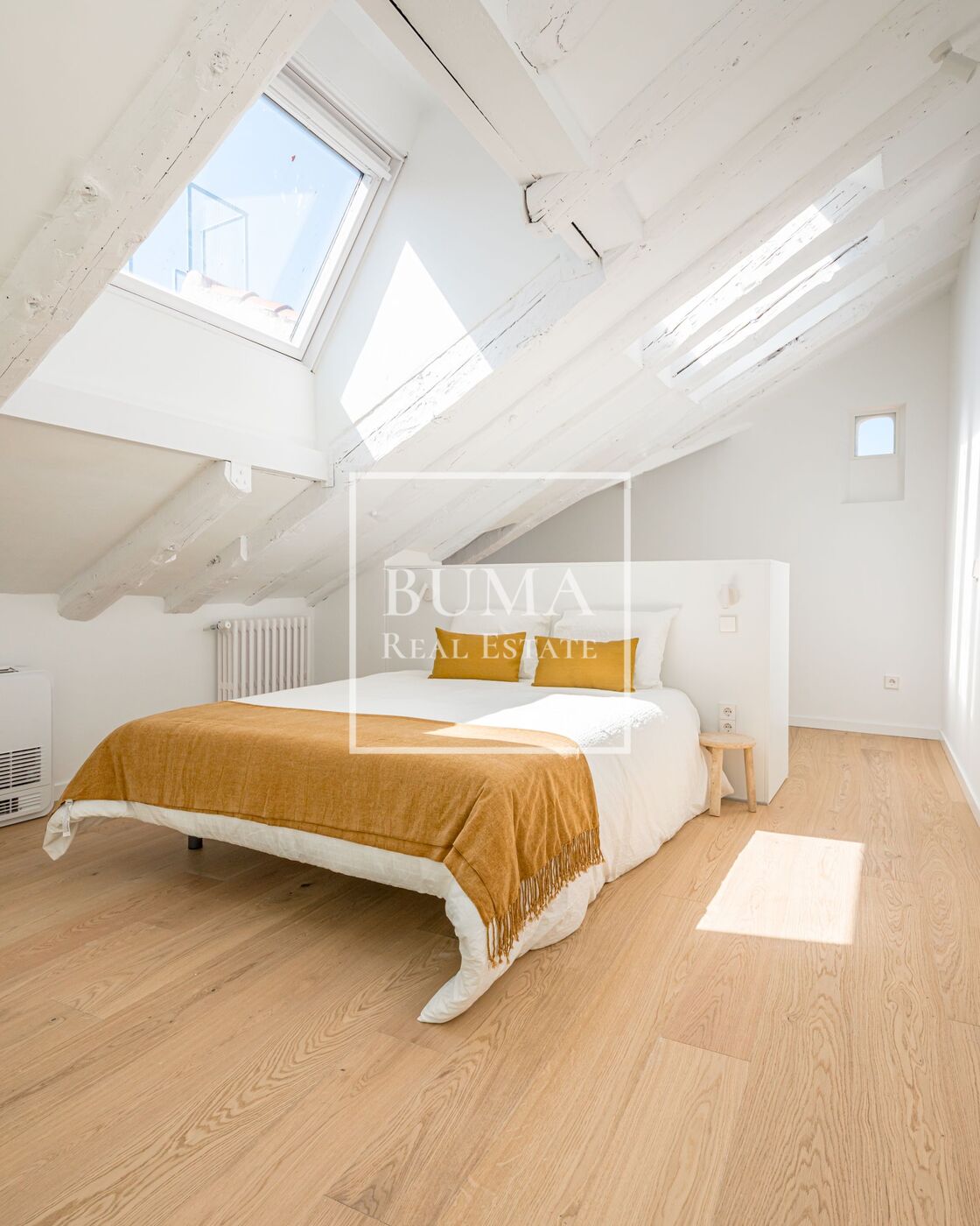 Exclusivo ático de diseño en venta con terrazas en el corazón de Madrid