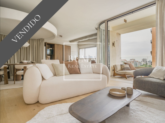 Exclusivo piso de diseño en venta con carácter único, recién reformado, con grandes ventanales, terraza y acabados de lujo